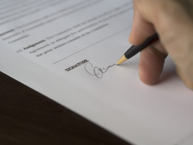Contract and black pencil