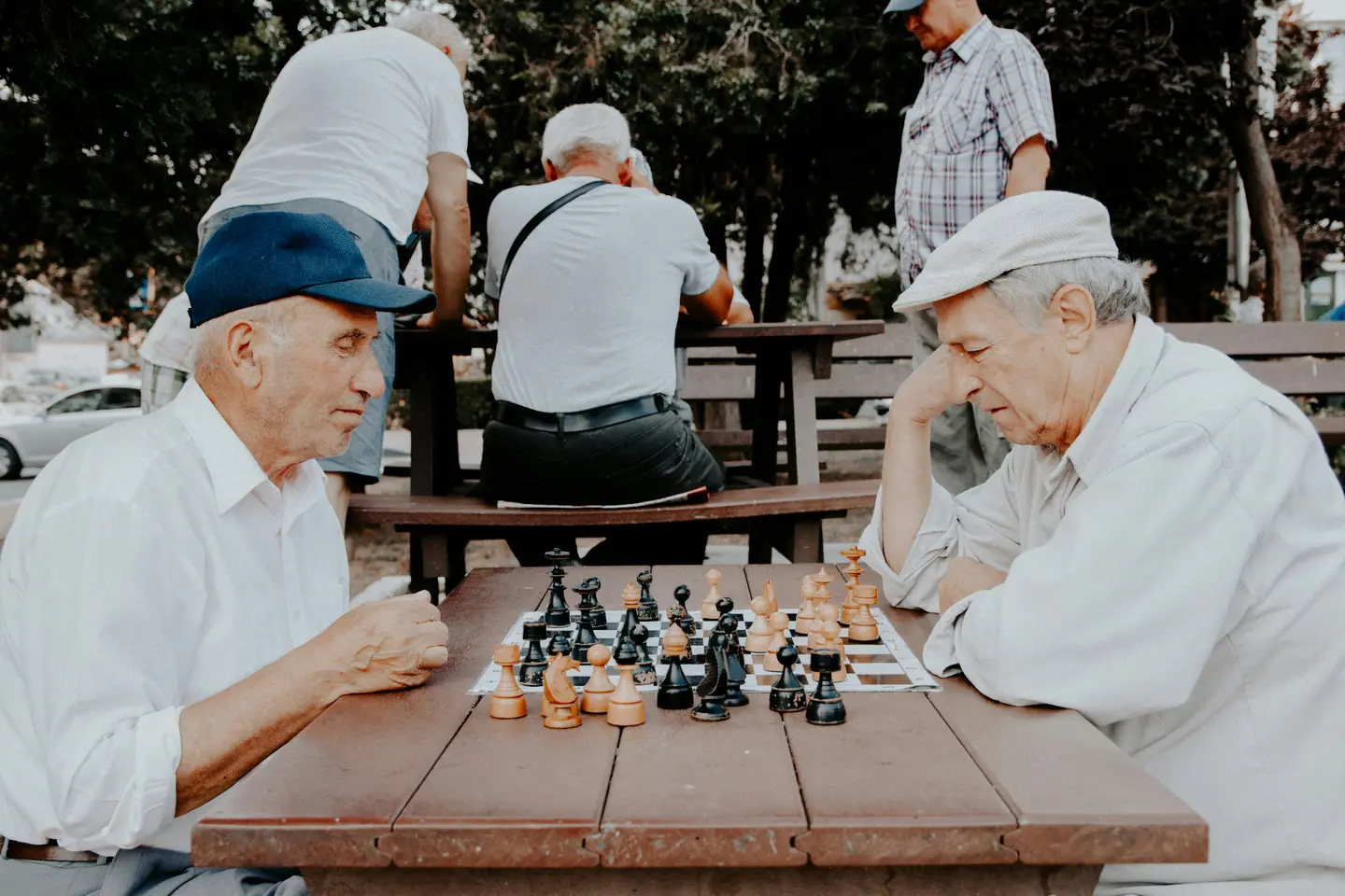 Older friends playing chess
